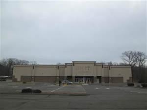 Commercial property inspected — empty commercial building parking lot 3