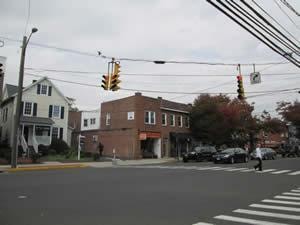 Commercial property inspected — brick building street intersection 4